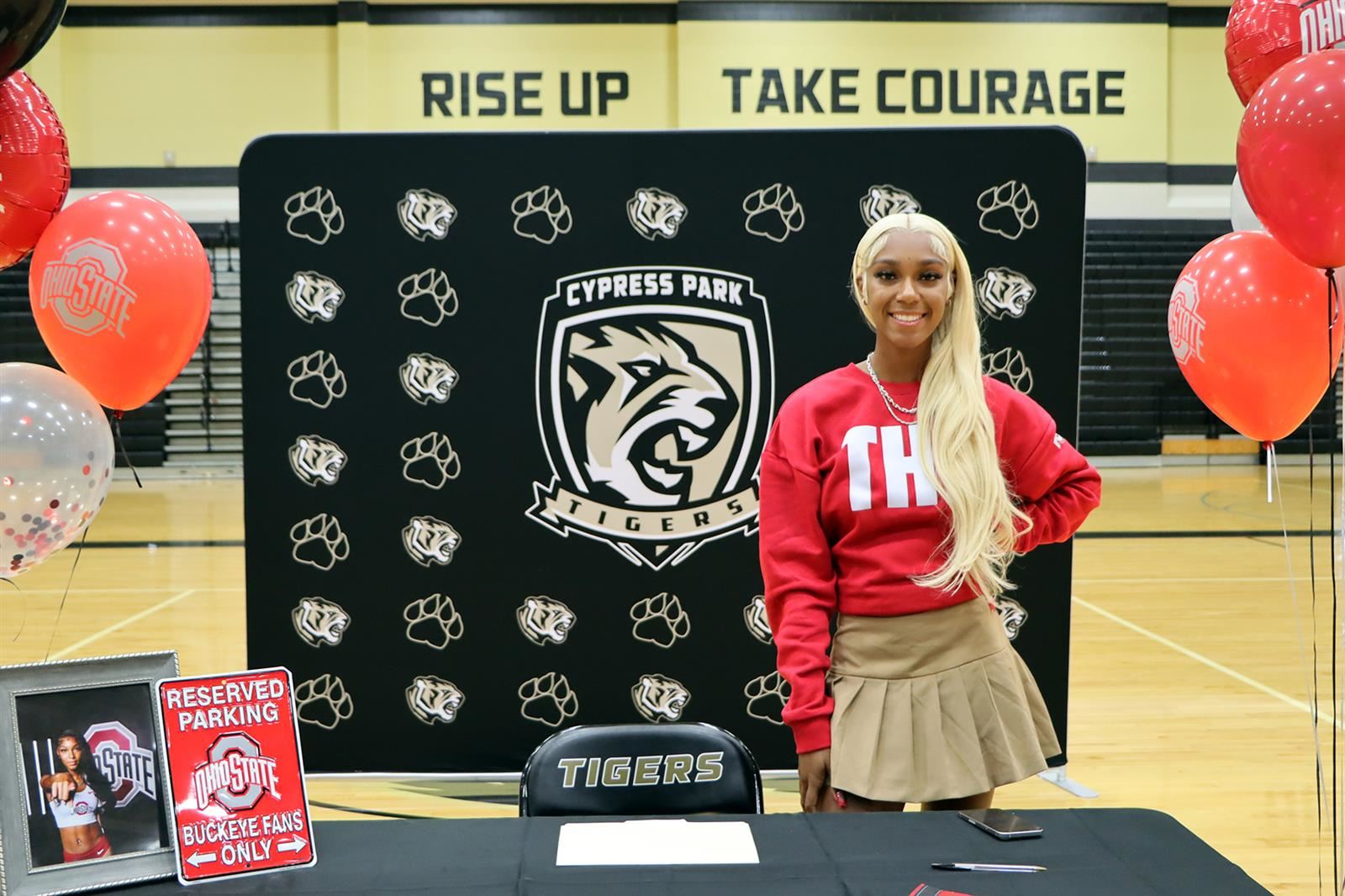 Cypress Park High School senior Sydnee Burr signed a letter of intent to run track collegiately at Ohio State University.